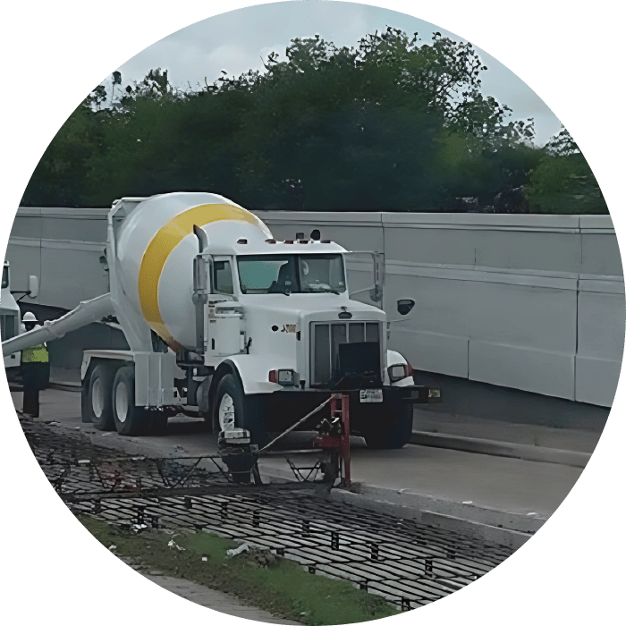 image of mixer trucks delivering custom concrete mix to job site